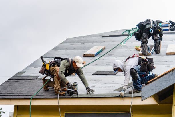Professional Gutter Installation technician working in Spring Mount, PA